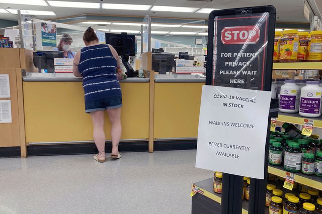 Sign at a pharmacy in a grocery store in Cape May Court House, New Jersey over the summer informs customers the Pfizer COVID-19 vaccine is in stock and walk-in coronavirus vaccinations are available.
